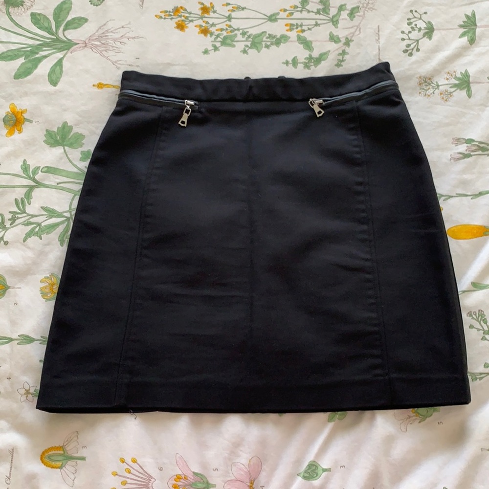 Black mini skirt with silver zippers
